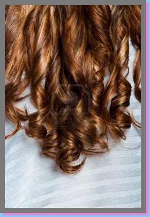 14679540-long-curly-professionally-dyed-red-hair-on-silver-background